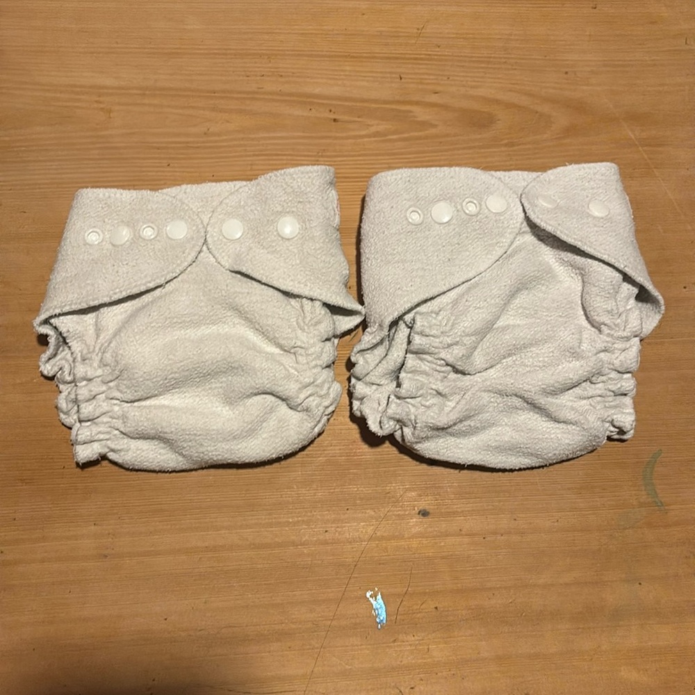 Two AMP hemp fitted cloth diapers